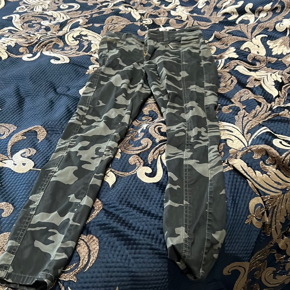 camouflaged pants stretchy used a couple times but no flaws